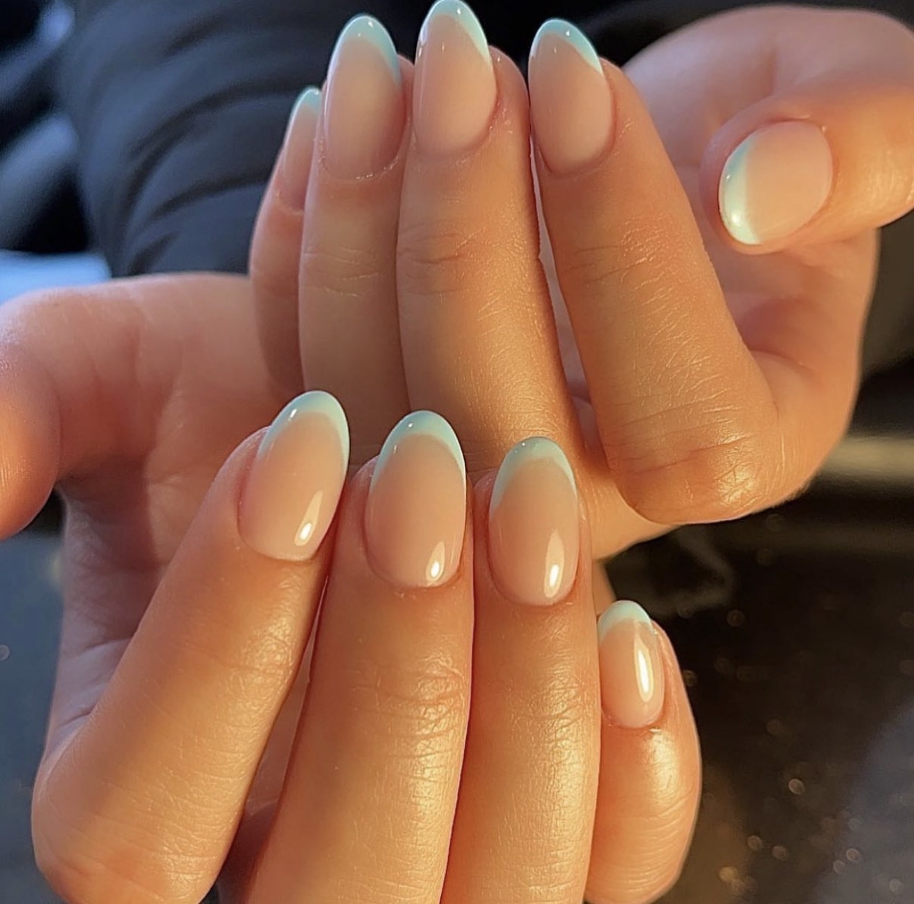 Almond nails with soft mint French tips