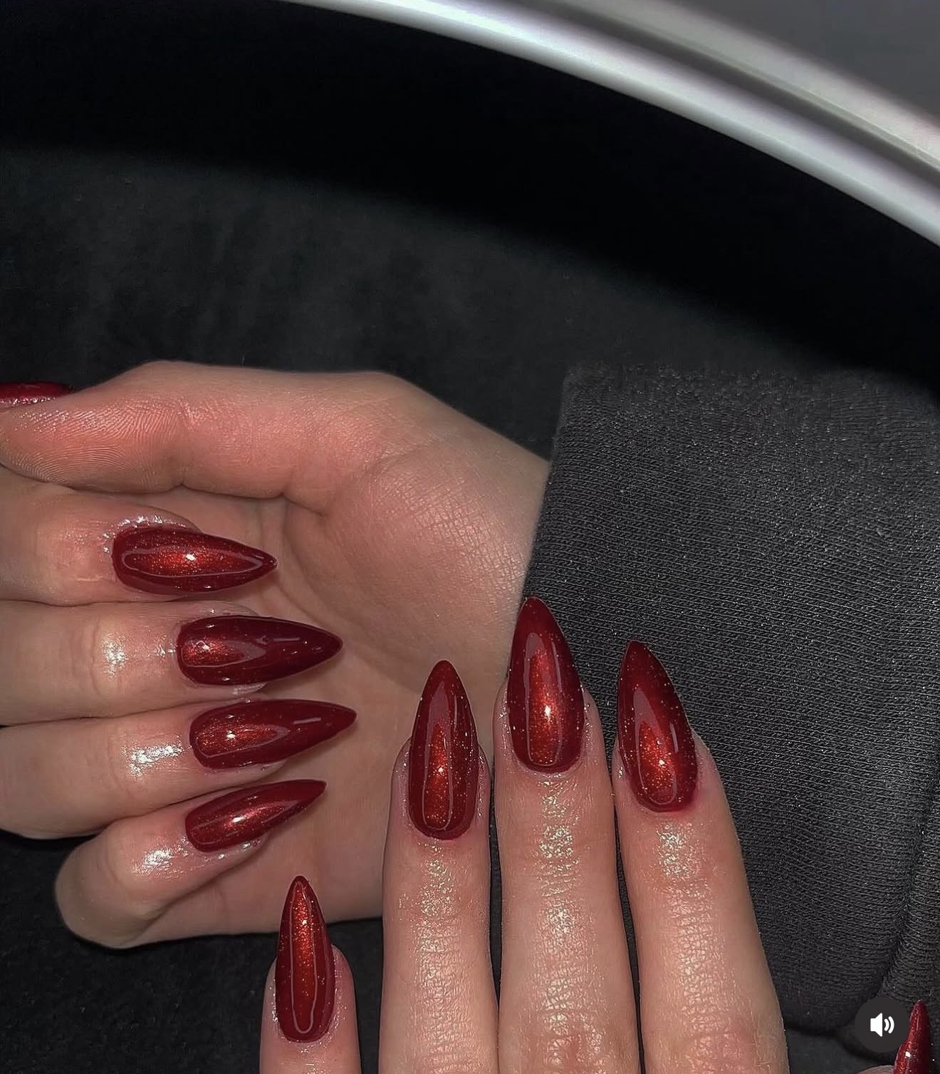 Deep red velvet stiletto nails with shimmer